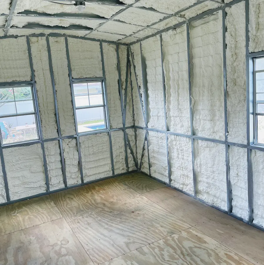 Closed-cell spray foam insulation applied to wall cavities in a residential project in Finneytown